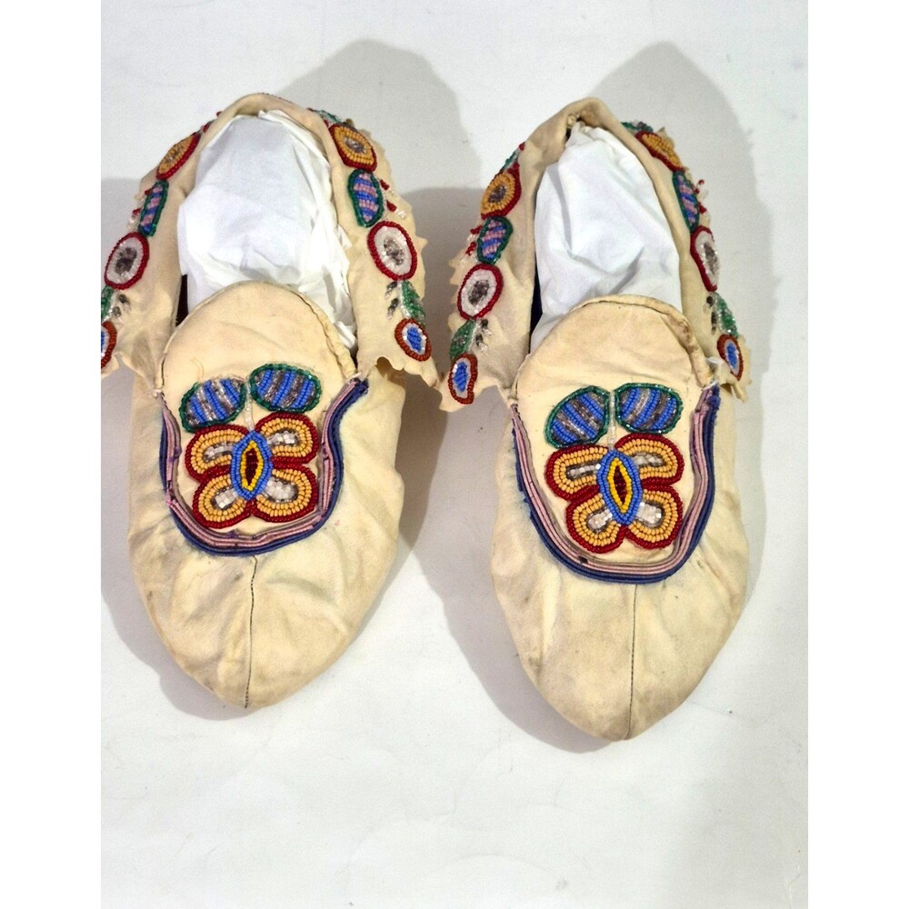 Vintage Crow Beaded Hide Moccasins featuring Intricate Colorful Glass Beadwork